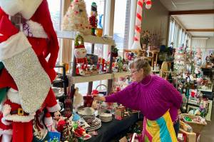 Ruth Clark has plenty of Christmas gift ideas at her And More Second Hand Store. (Sheri Regnier/Trail Times)